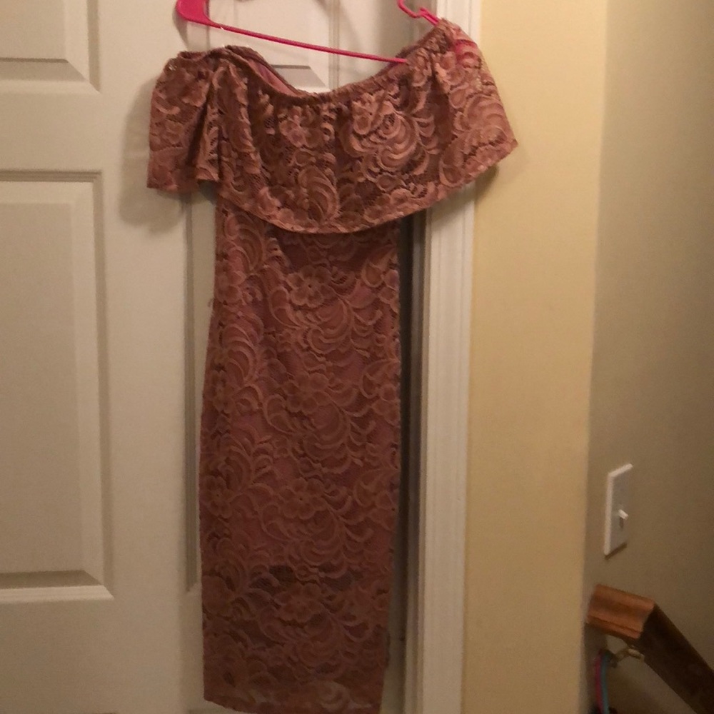 A cute off the shoulder body on dress.